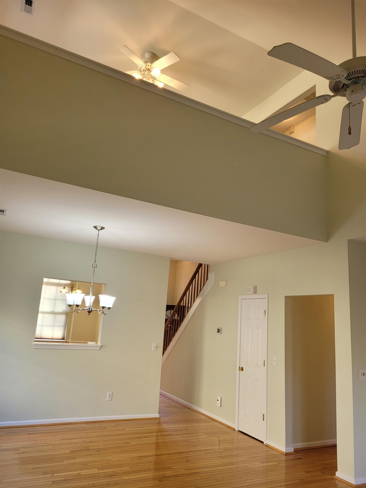 7 Calaveras Court Durham, NC 27713 - Photo 10 of 30 a view of a room with window and wooden floor
