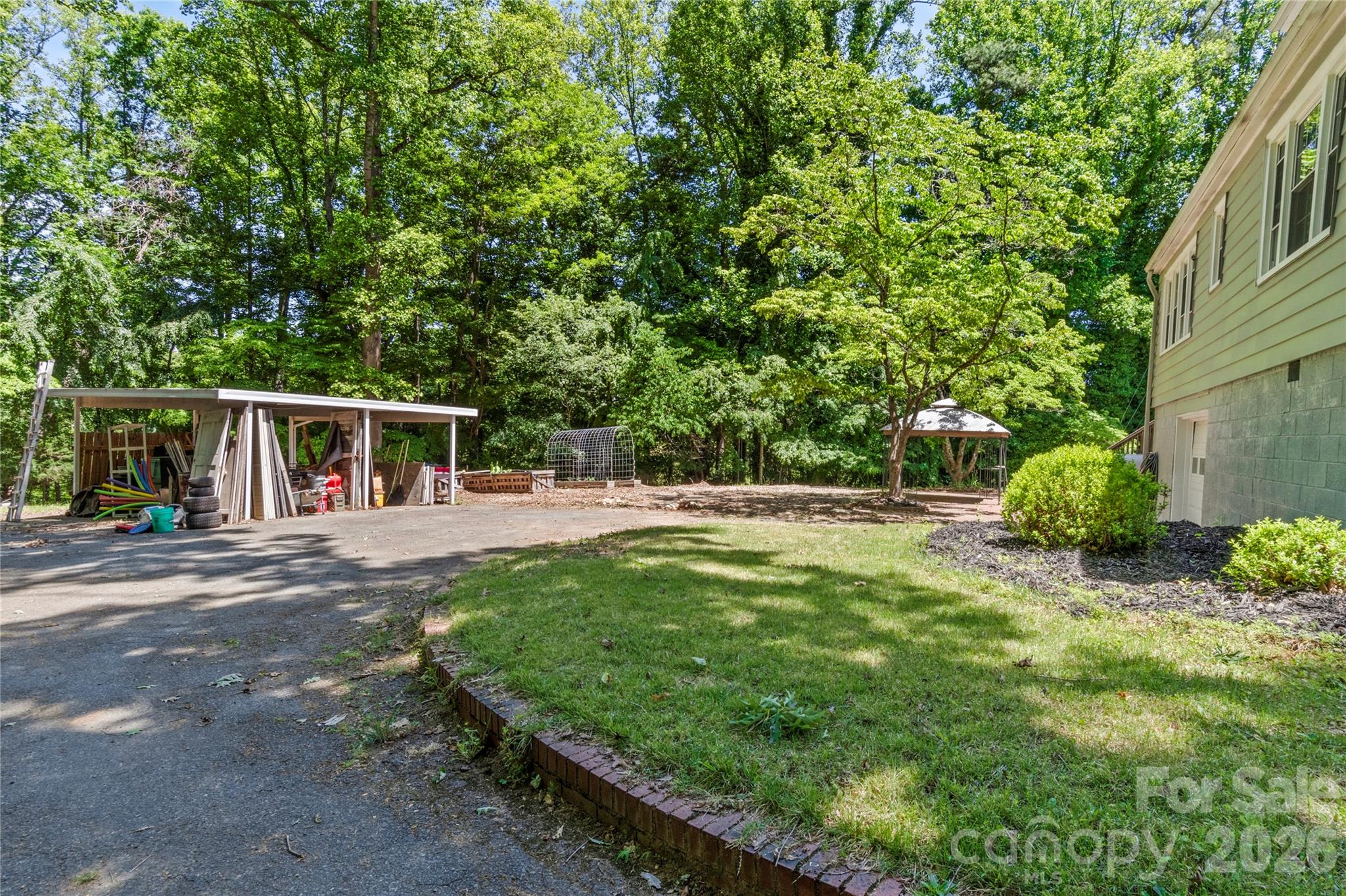 951 Dodson Mill Road Pilot Mountain, NC 27041 - Photo 36 of 48 a view of backyard with large trees