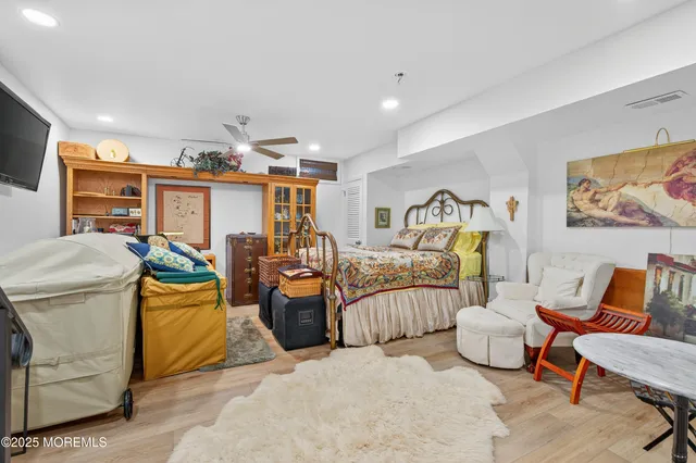 a bedroom with furniture and a couch