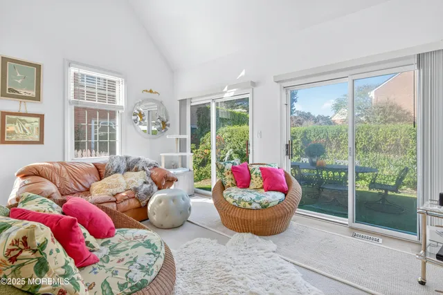 a living room with furniture and window