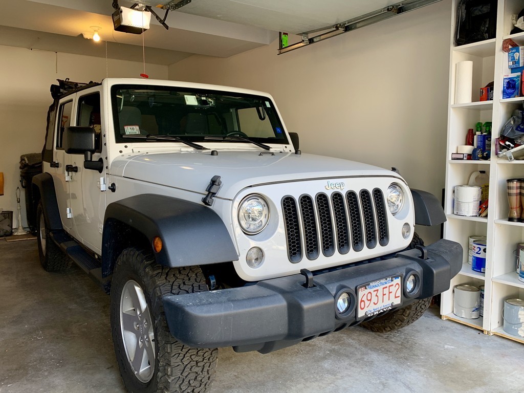 130 Turnpike Road, Unit 13 Chelmsford, MA 01824 - Photo 31 of 35 a utility room with a car parked