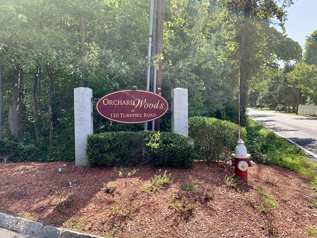 130 Turnpike Road, Unit 13 Chelmsford, MA 01824 - Photo 35 of 35 a view of a bench in a garden