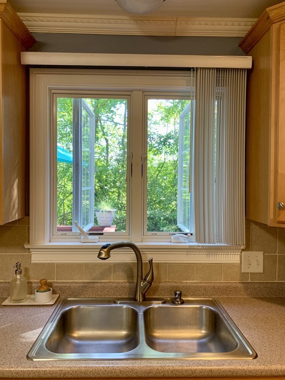 130 Turnpike Road, Unit 13 Chelmsford, MA 01824 - Photo 5 of 35 a close view of sink and tap