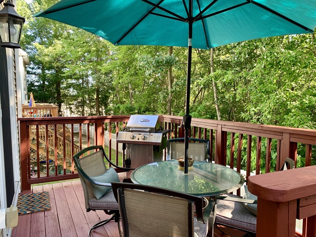 130 Turnpike Road, Unit 13 Chelmsford, MA 01824 - Photo 9 of 35 a balcony view with a seating space