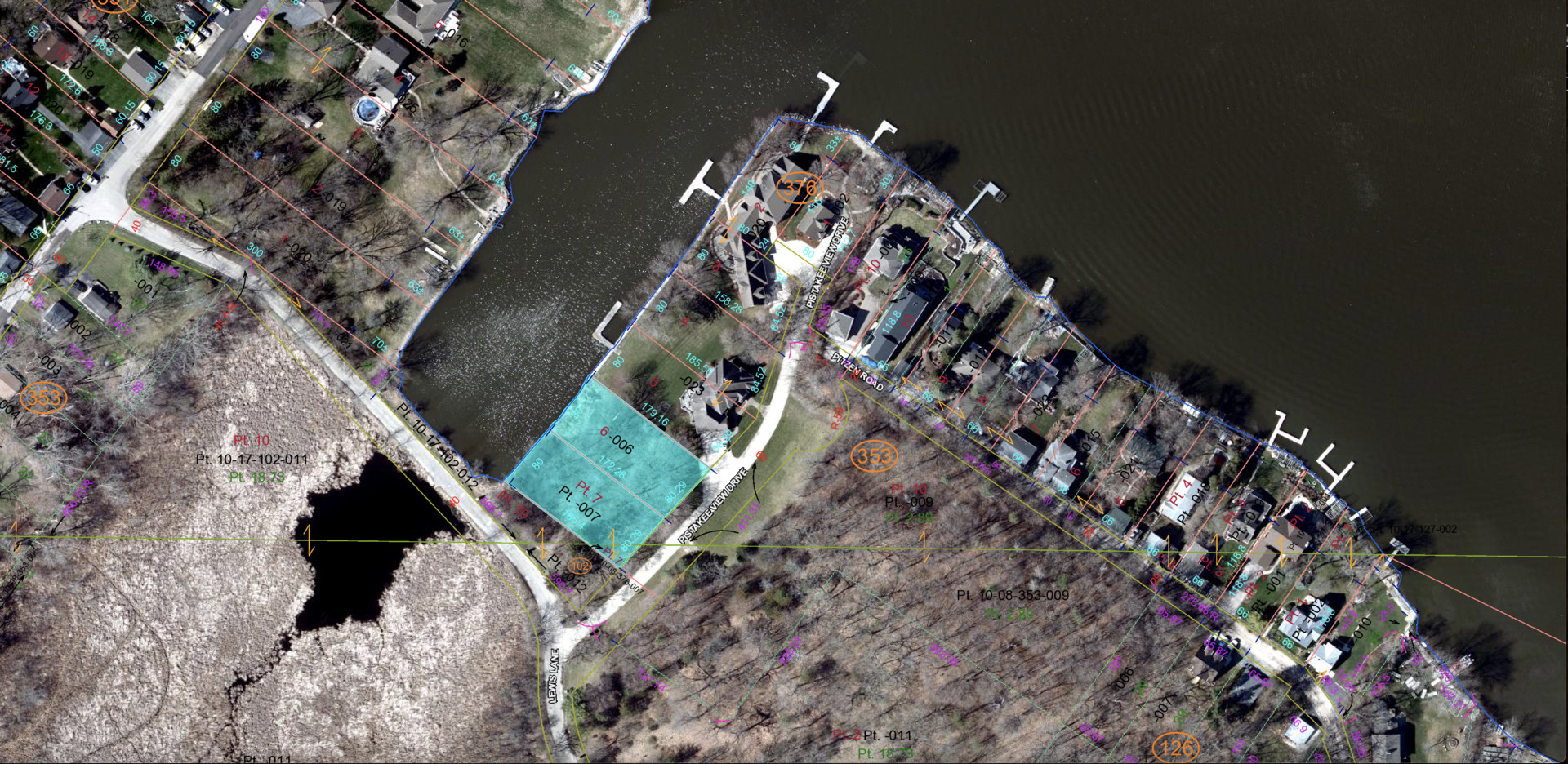 a vase of flowers sitting on a floor