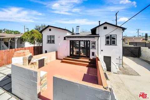 a view of a house with a patio