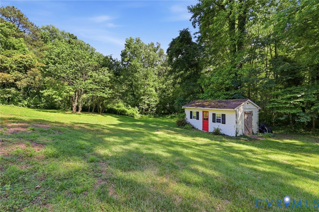 11200 Surry Road Chester, VA 23831 - Photo 5 of 48 a view of a house with a big yard