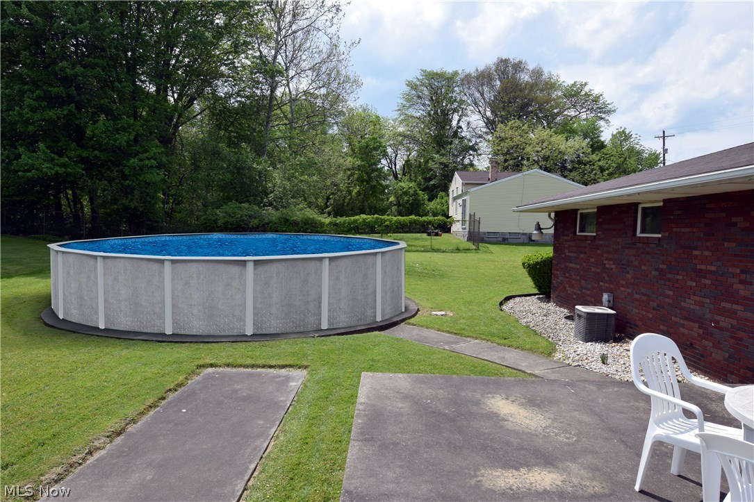 2850 Reeves Road Northeast Warren, OH 44483 - Photo 28 of 31 Cement pad is ready for an above ground pool or a fire pit ready for your special touches (pool not included)