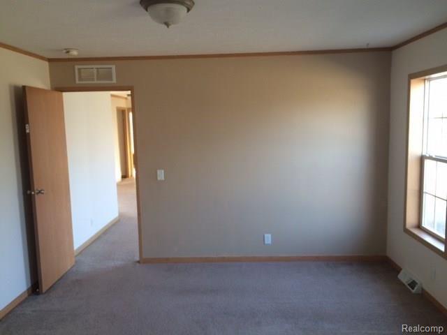 9747 Page Road Marlette, MI 48453 - Photo 11 of 29 262-165773 master bedroom 3.jpg