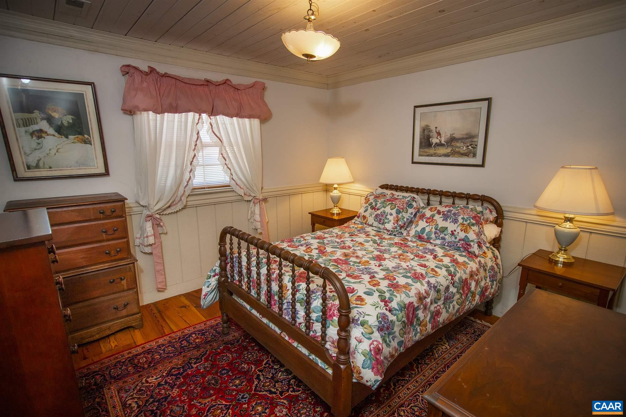 145 Turkey Way Amherst, VA 24521 - Photo 16 of 39 a bedroom with bed and a window