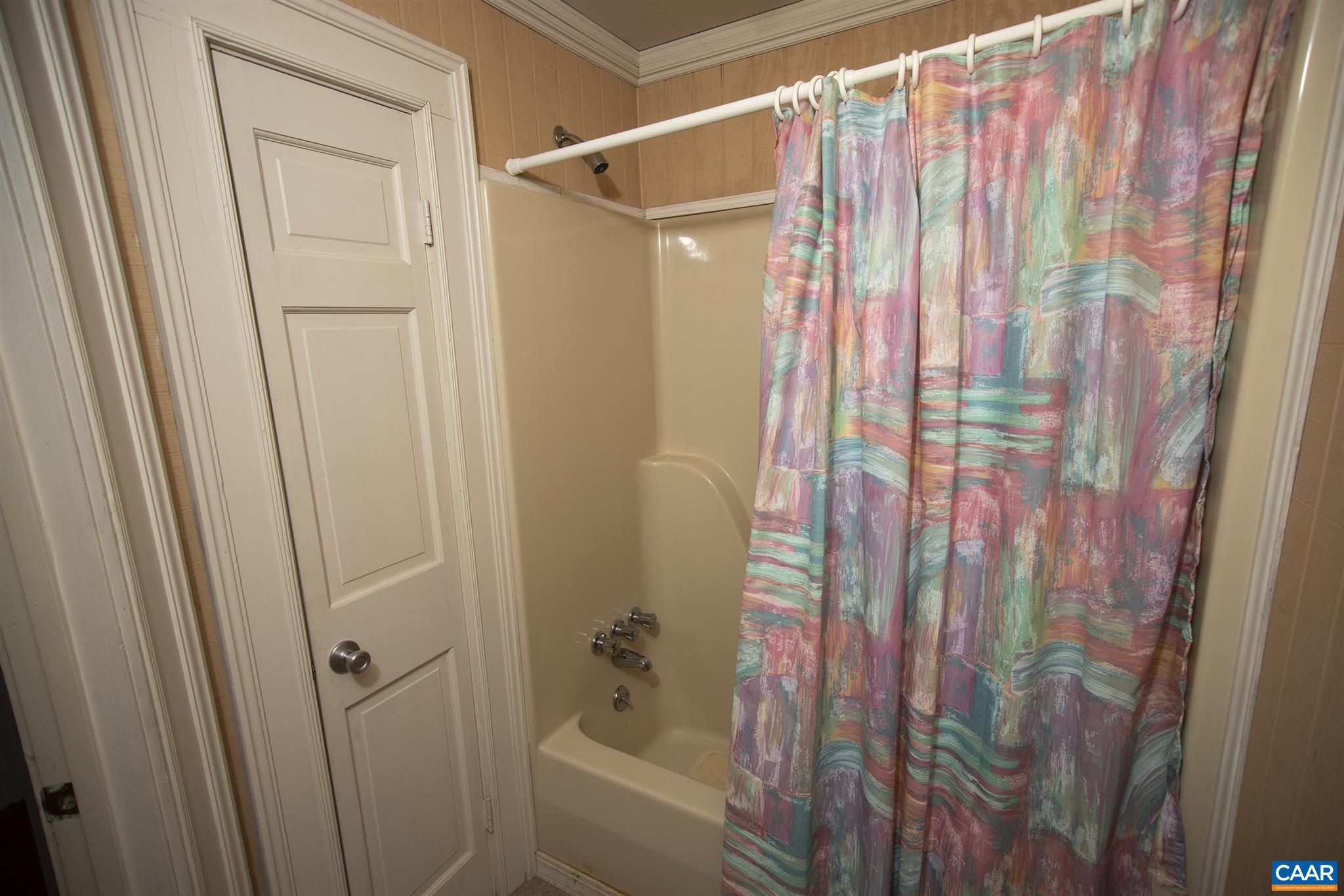 145 Turkey Way Amherst, VA 24521 - Photo 17 of 39 a bathroom with a shower curtain and a curtain