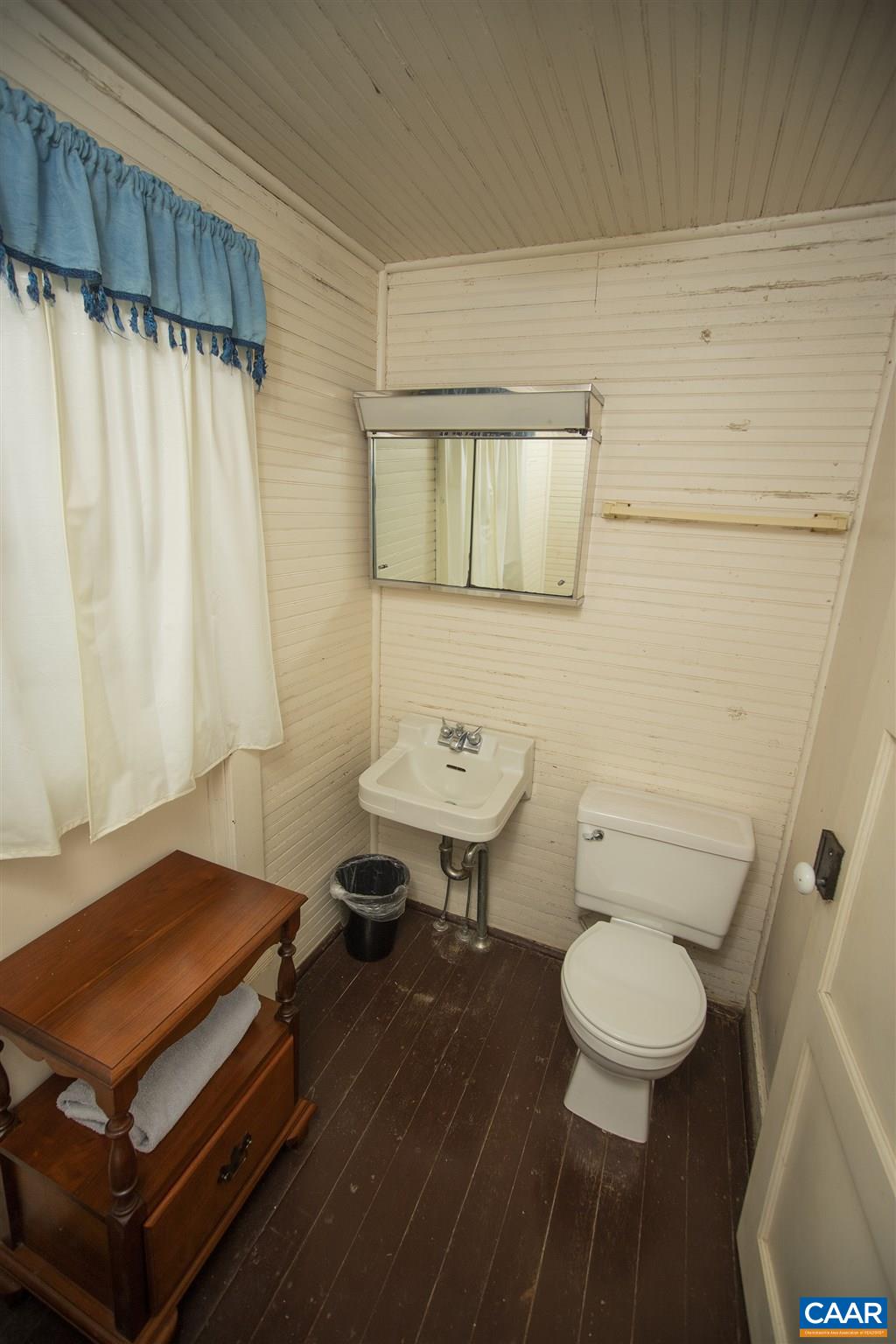 145 Turkey Way Amherst, VA 24521 - Photo 23 of 39 a bathroom with a toilet and a shower