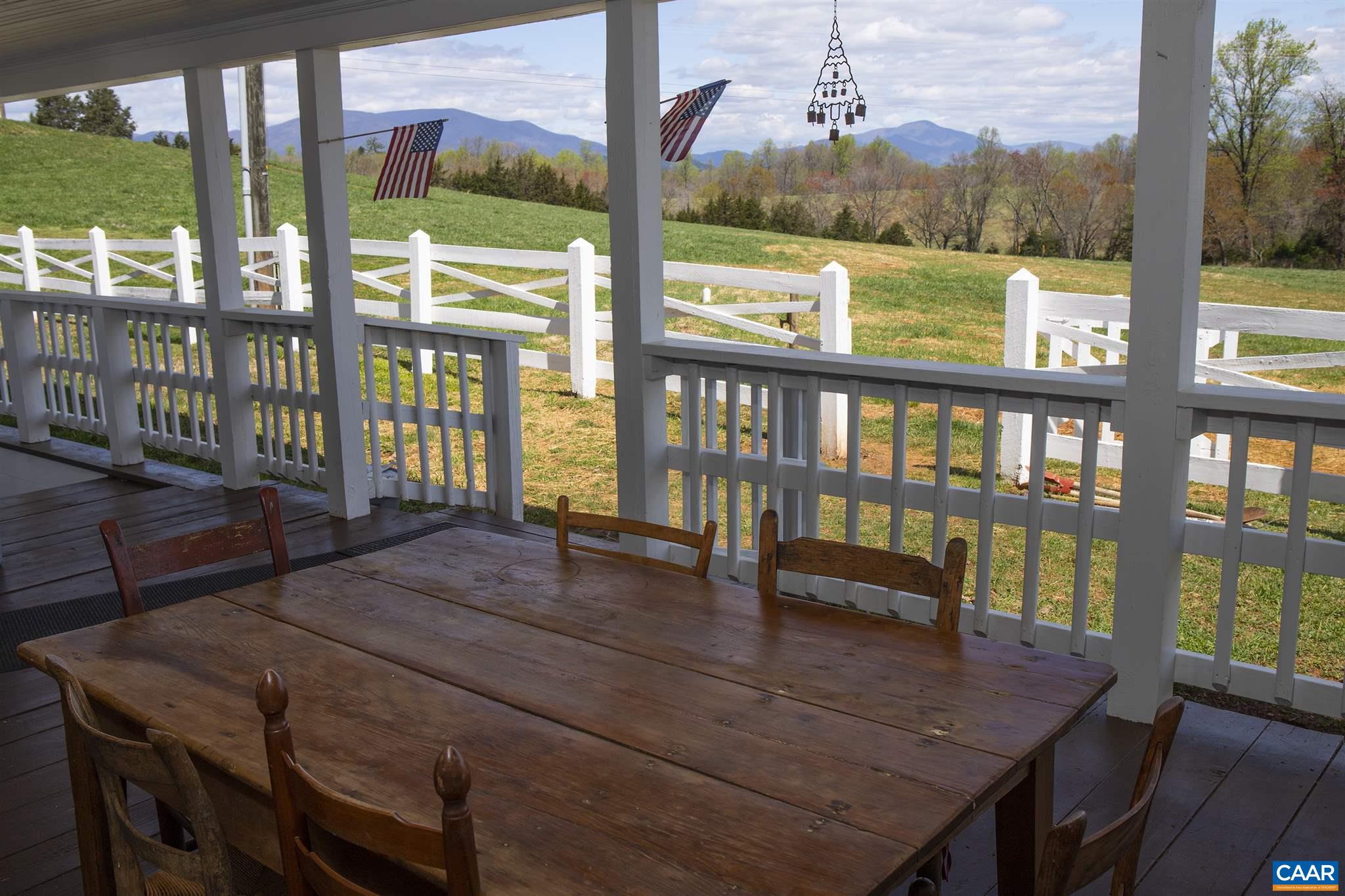 145 Turkey Way Amherst, VA 24521 - Photo 4 of 39 a view of a dining room with furniture window and wooden floor