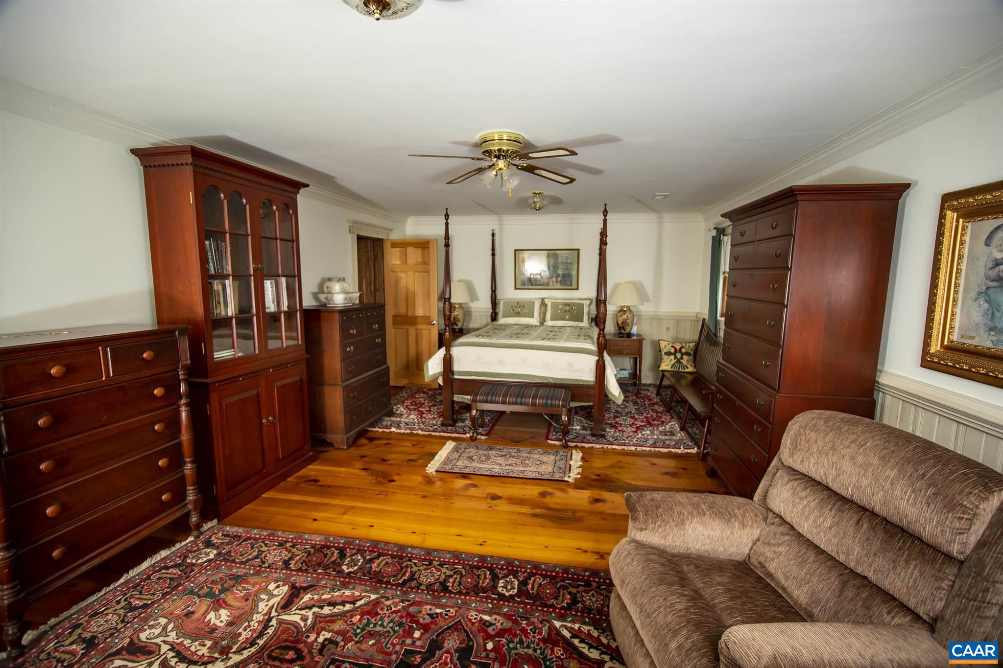 145 Turkey Way Amherst, VA 24521 - Photo 9 of 39 a bedroom with furniture and wooden floor