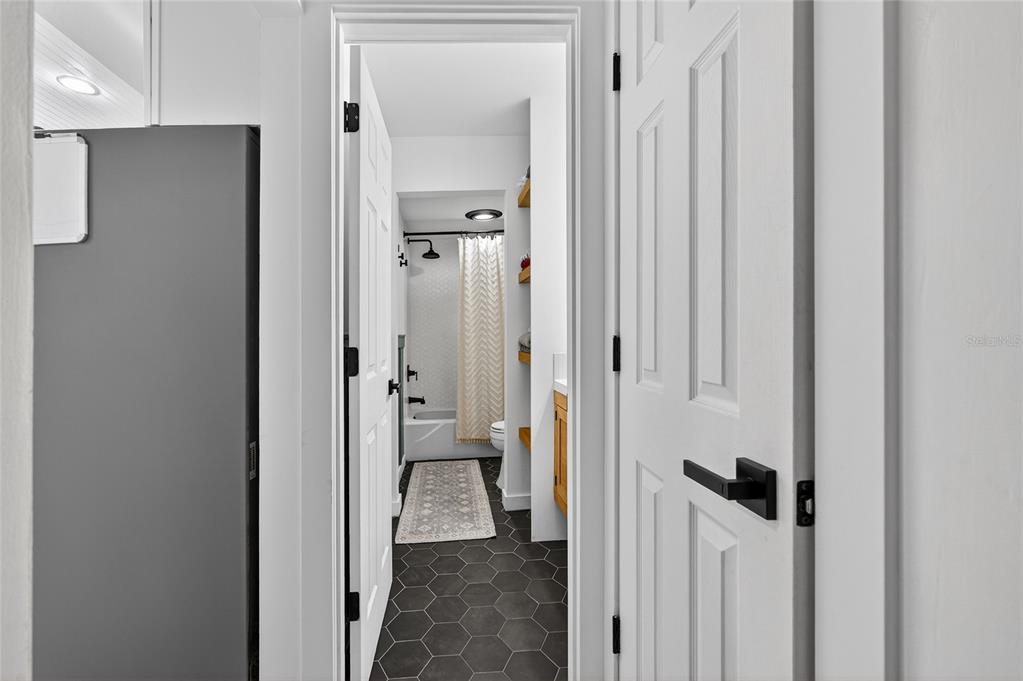 532 Center Road Venice, FL 34285 - Photo 25 of 68 a view of a bathroom from a hallway