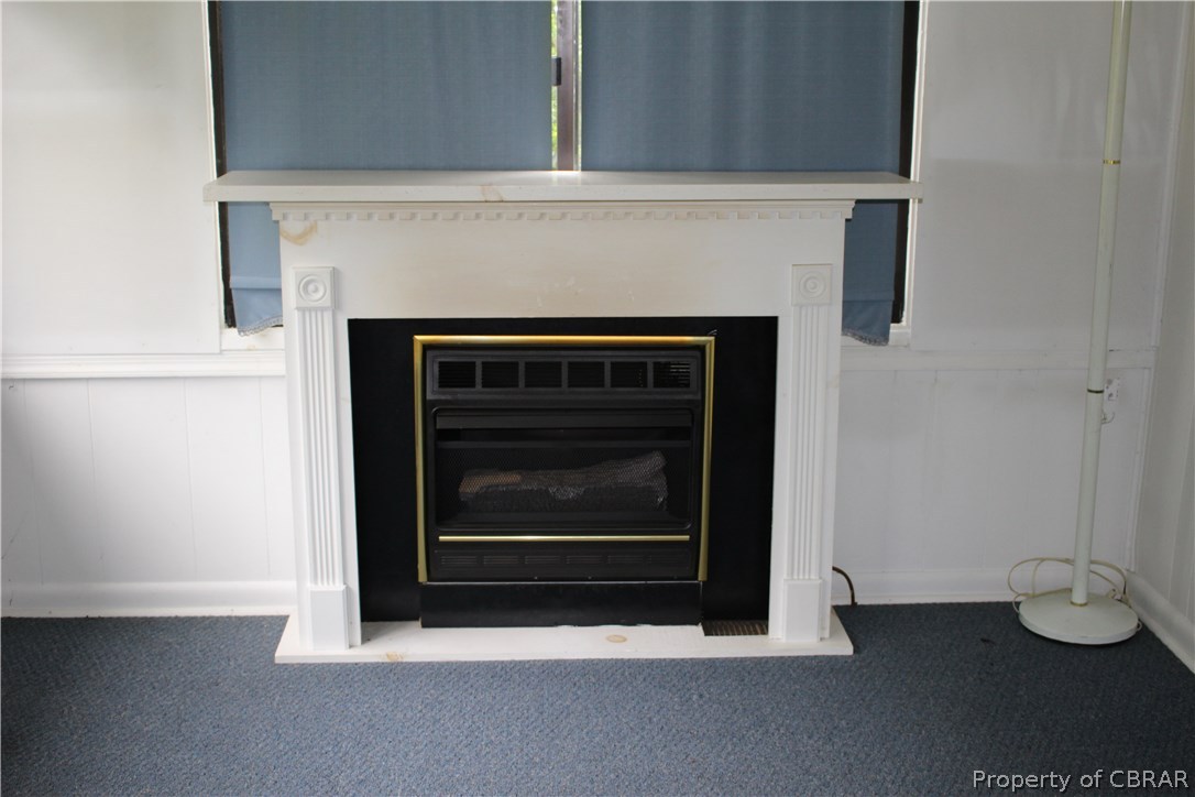 271 Ballast Point Road Hudgins, VA 23076 - Photo 14 of 24 Gas fireplace in Sun Room