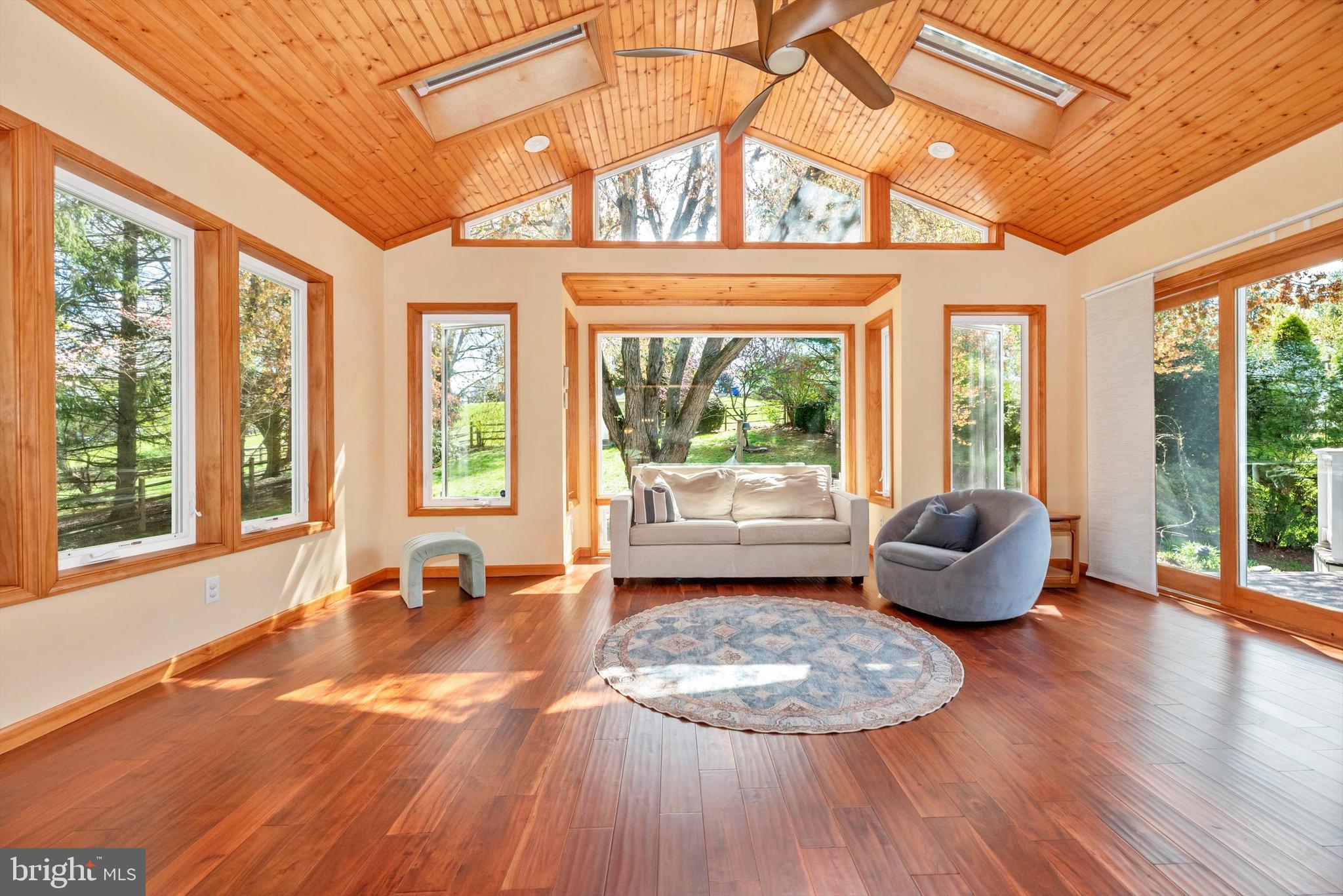 19605 Charline Manor Road Olney, MD 20832 - Photo 12 of 54 an outdoor space with lounge chair and windows
