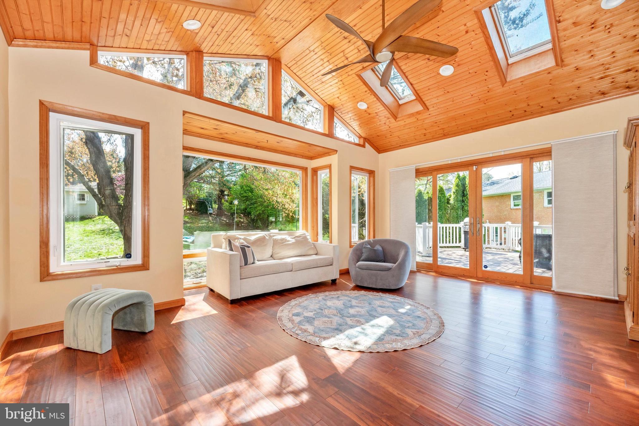 19605 Charline Manor Road Olney, MD 20832 - Photo 13 of 54 a living room with furniture and wooden floor