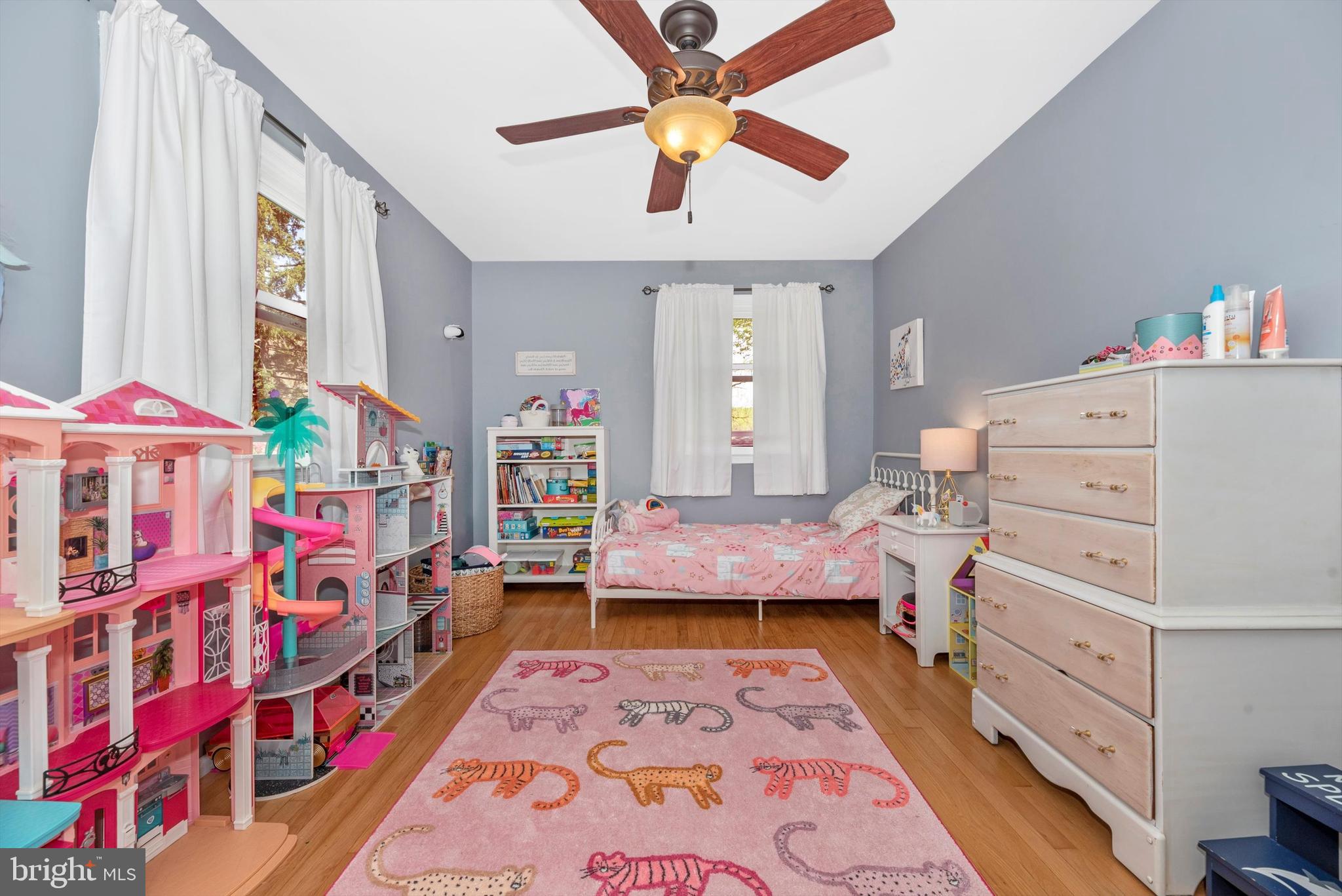 19605 Charline Manor Road Olney, MD 20832 - Photo 17 of 54 a bed room with furniture and a baby crib