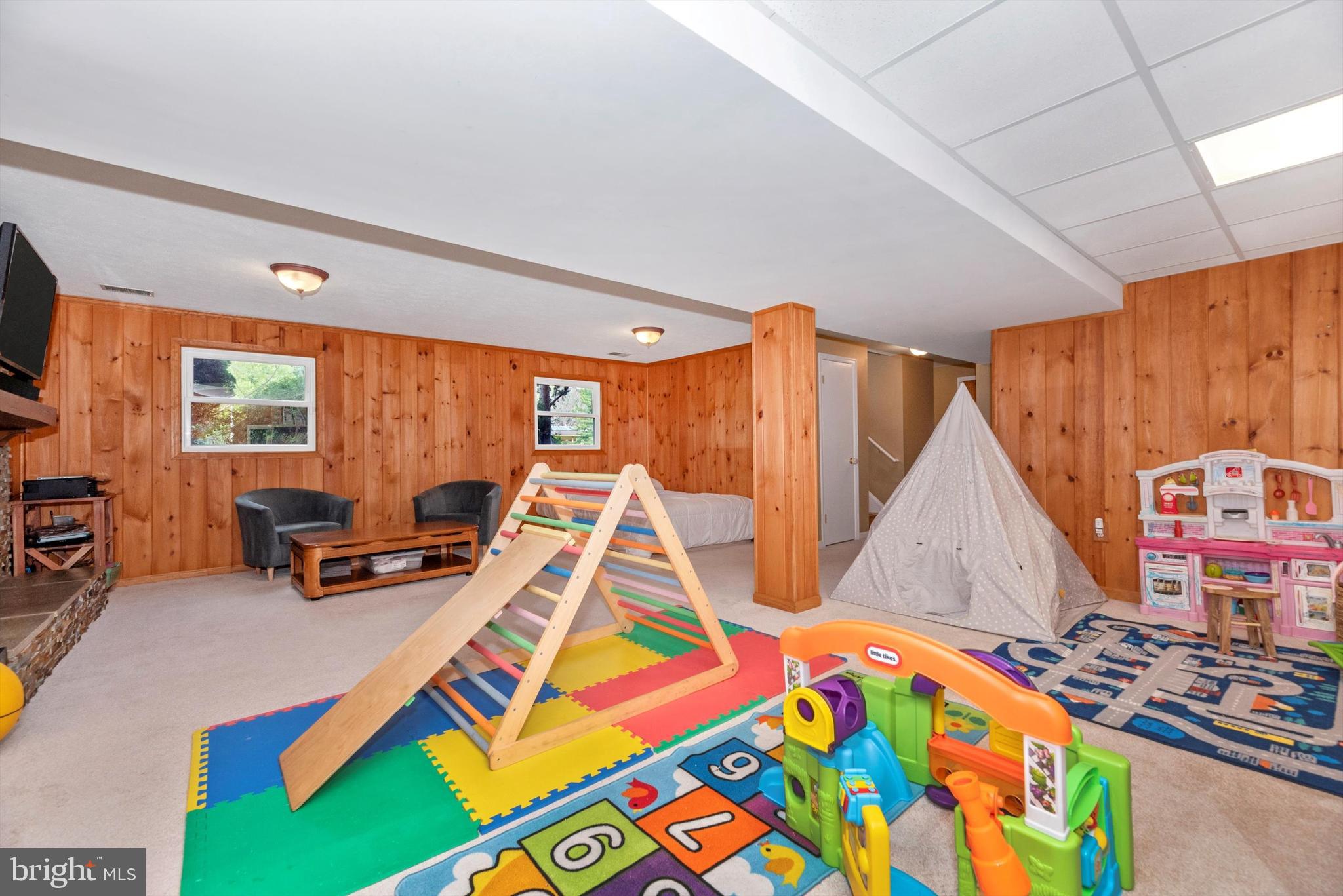 19605 Charline Manor Road Olney, MD 20832 - Photo 26 of 54 a bedroom with furniture and a wooden floor