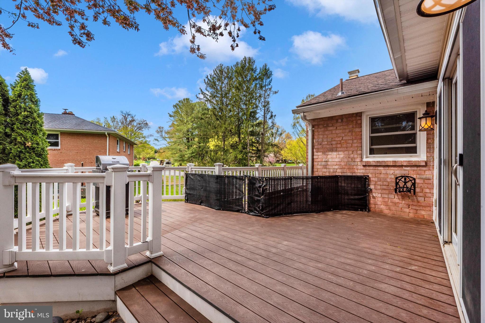 19605 Charline Manor Road Olney, MD 20832 - Photo 30 of 54 a view of balcony with wooden floor and fence