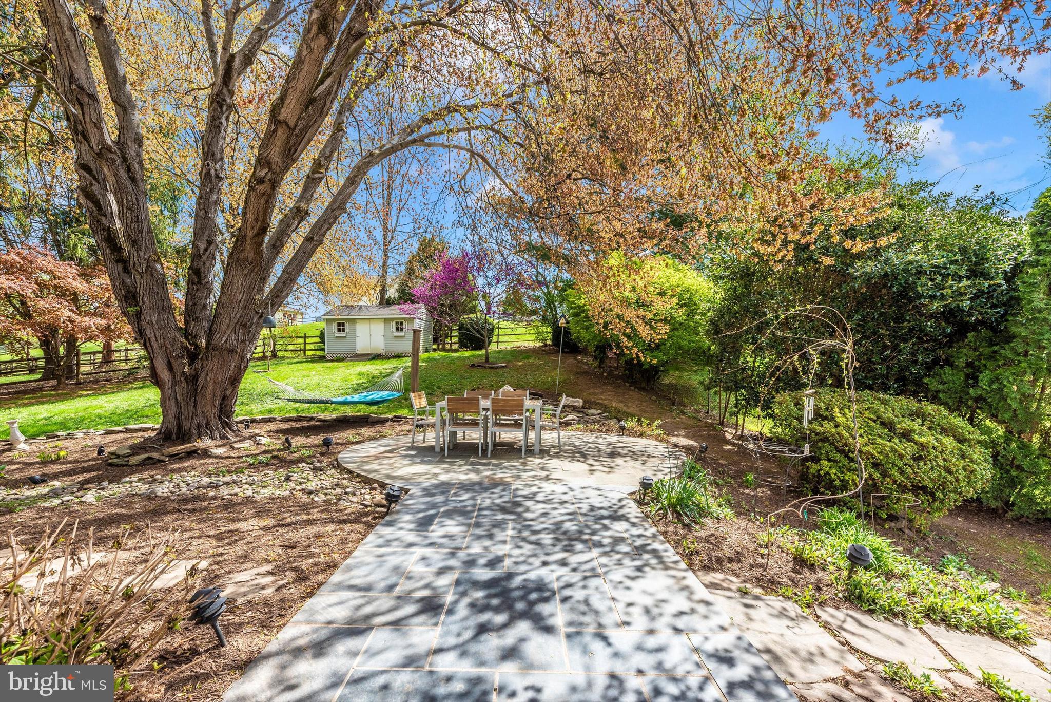 19605 Charline Manor Road Olney, MD 20832 - Photo 31 of 54 a bench is sitting in the middle of a park