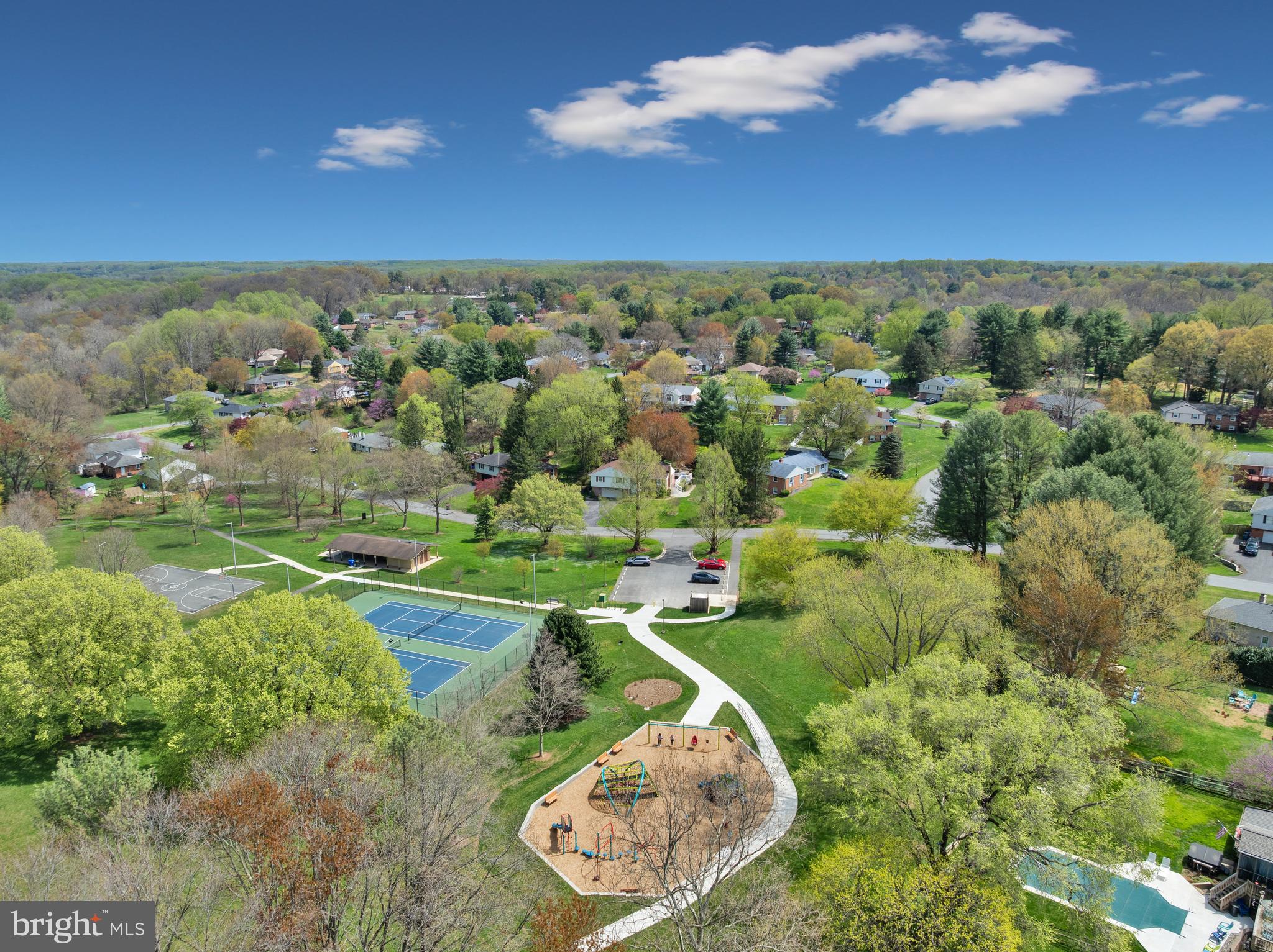 19605 Charline Manor Road Olney, MD 20832 - Photo 40 of 54 an aerial view of a residential houses with outdoor space and trees all around