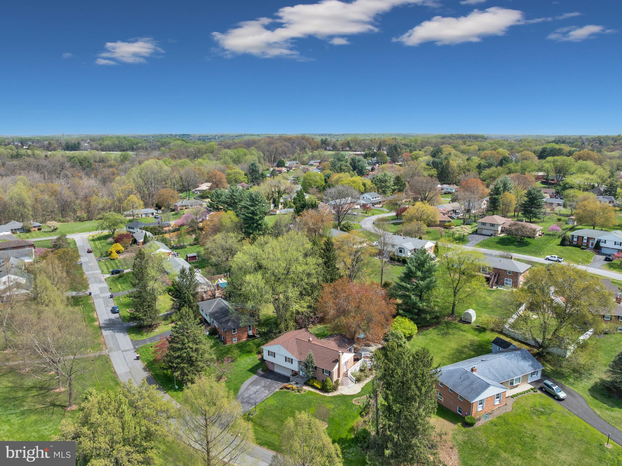 19605 Charline Manor Road Olney, MD 20832 - Photo 46 of 54 an aerial view of residential houses with outdoor space and trees