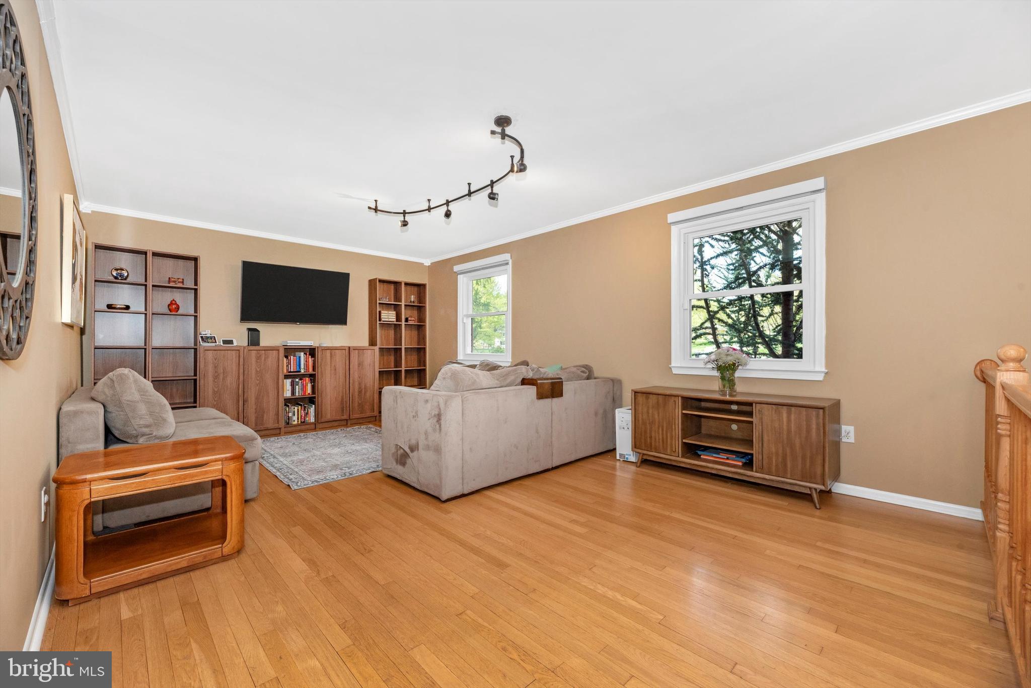 19605 Charline Manor Road Olney, MD 20832 - Photo 5 of 54 a living room with furniture and a flat screen tv
