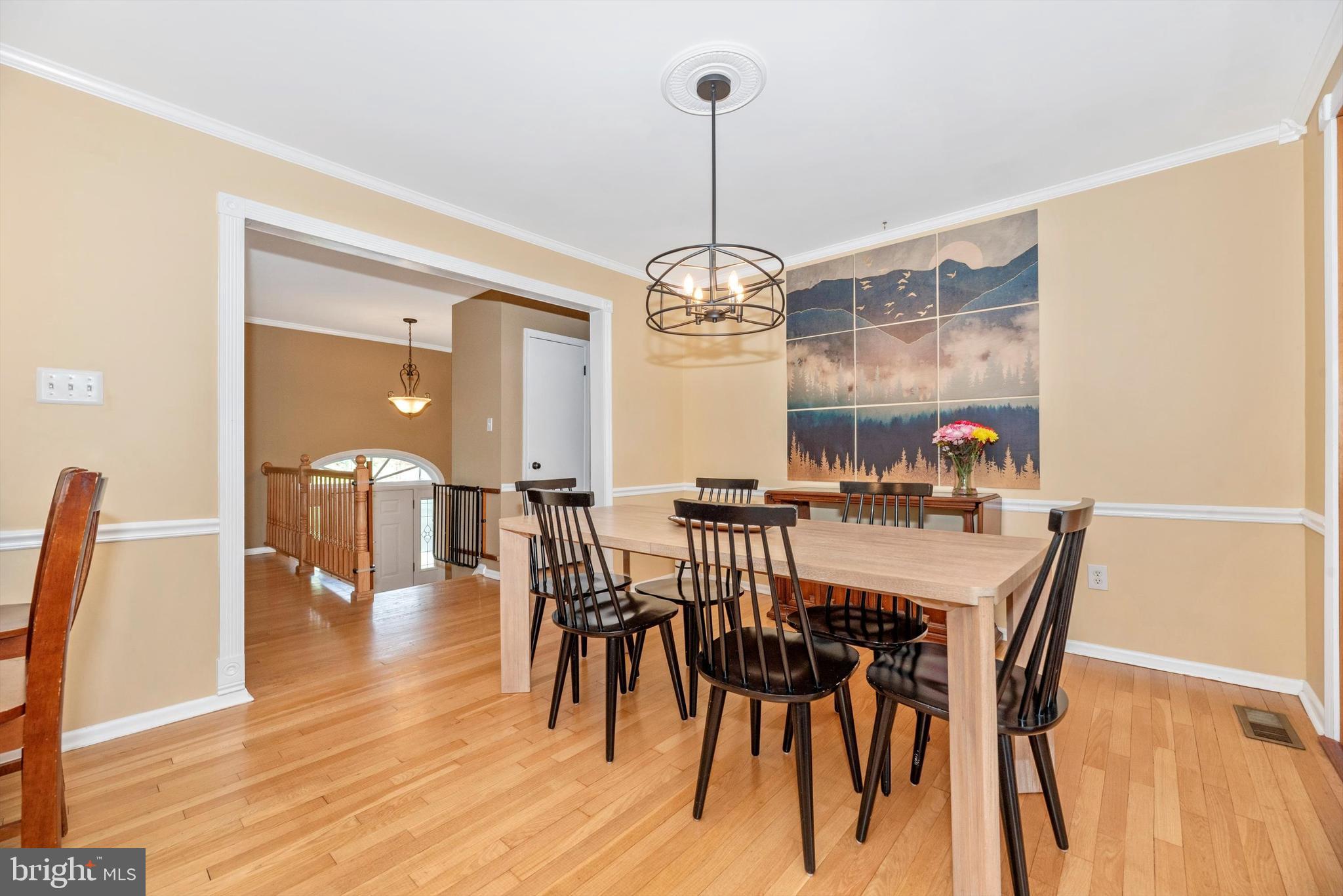 19605 Charline Manor Road Olney, MD 20832 - Photo 7 of 54 a view of a dining room with furniture window and wooden floor