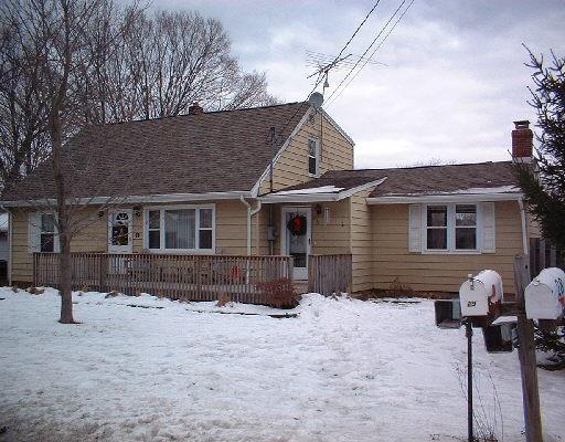 28 Sorghum Road Shelton, CT 06484 - Photo 1 of 1 a front view of a house with yard covered in snow