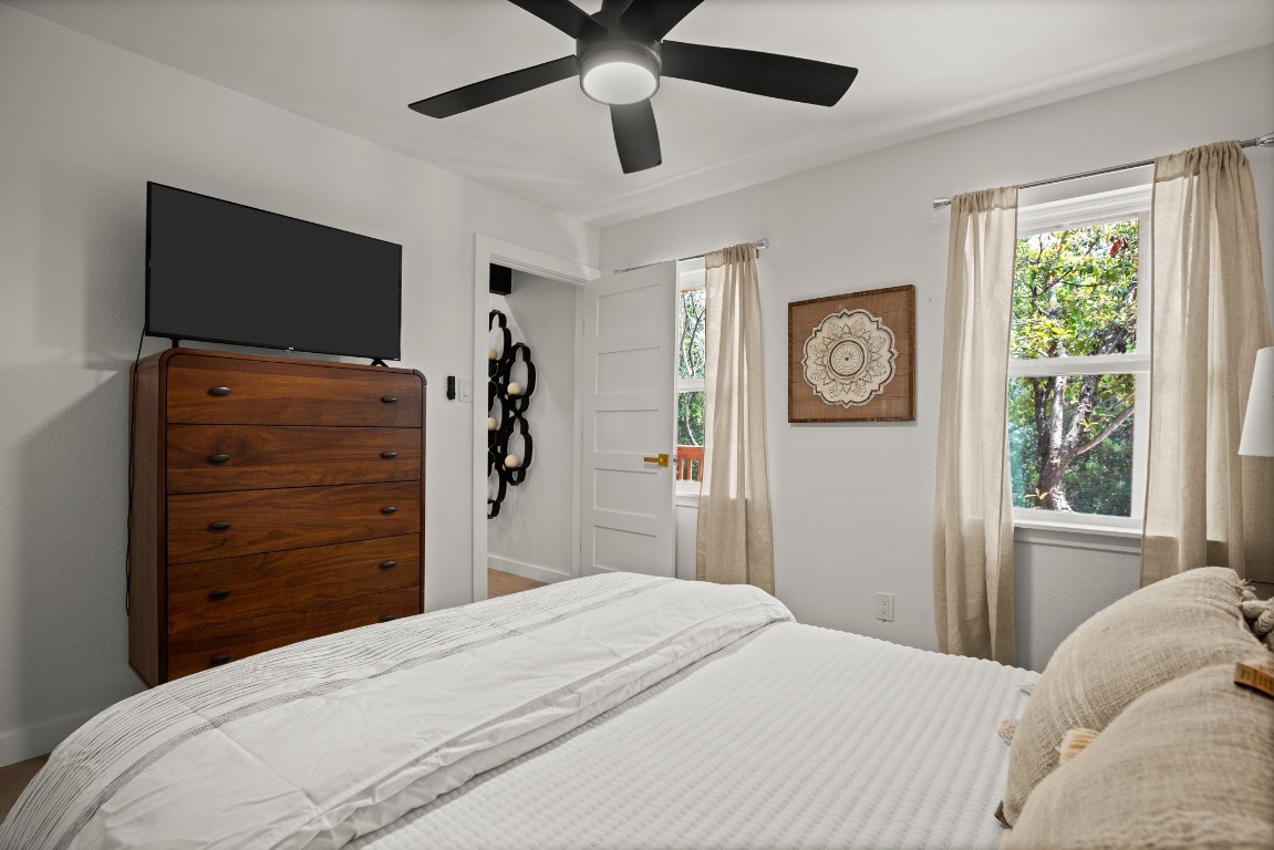 3904 Highland Drive Austin, TX 78734 - Photo 29 of 37 Bedroom with multiple windows and ceiling fan