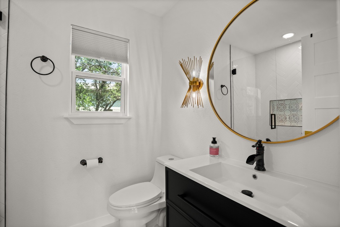 3904 Highland Drive Austin, TX 78734 - Photo 36 of 37 Bathroom featuring a shower stall and vanity
