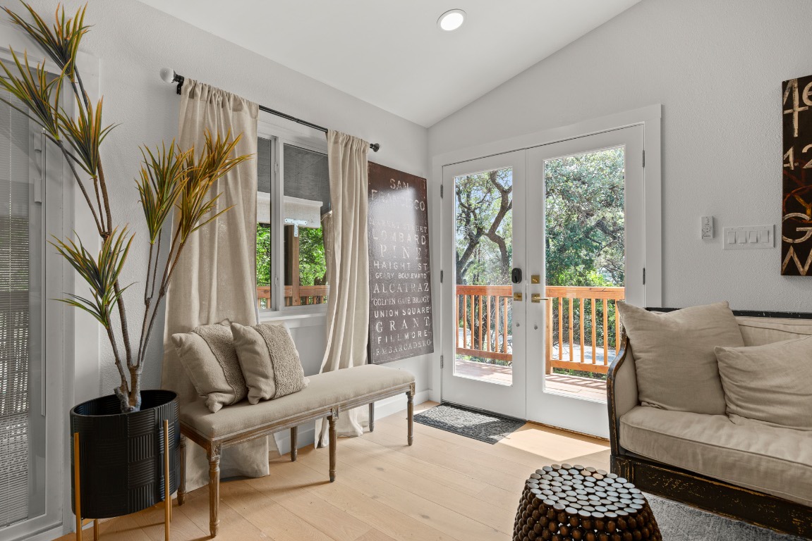 3904 Highland Drive Austin, TX 78734 - Photo 6 of 37 Sitting room featuring lofted ceiling, wood-type flooring, french doors, and recessed lighting