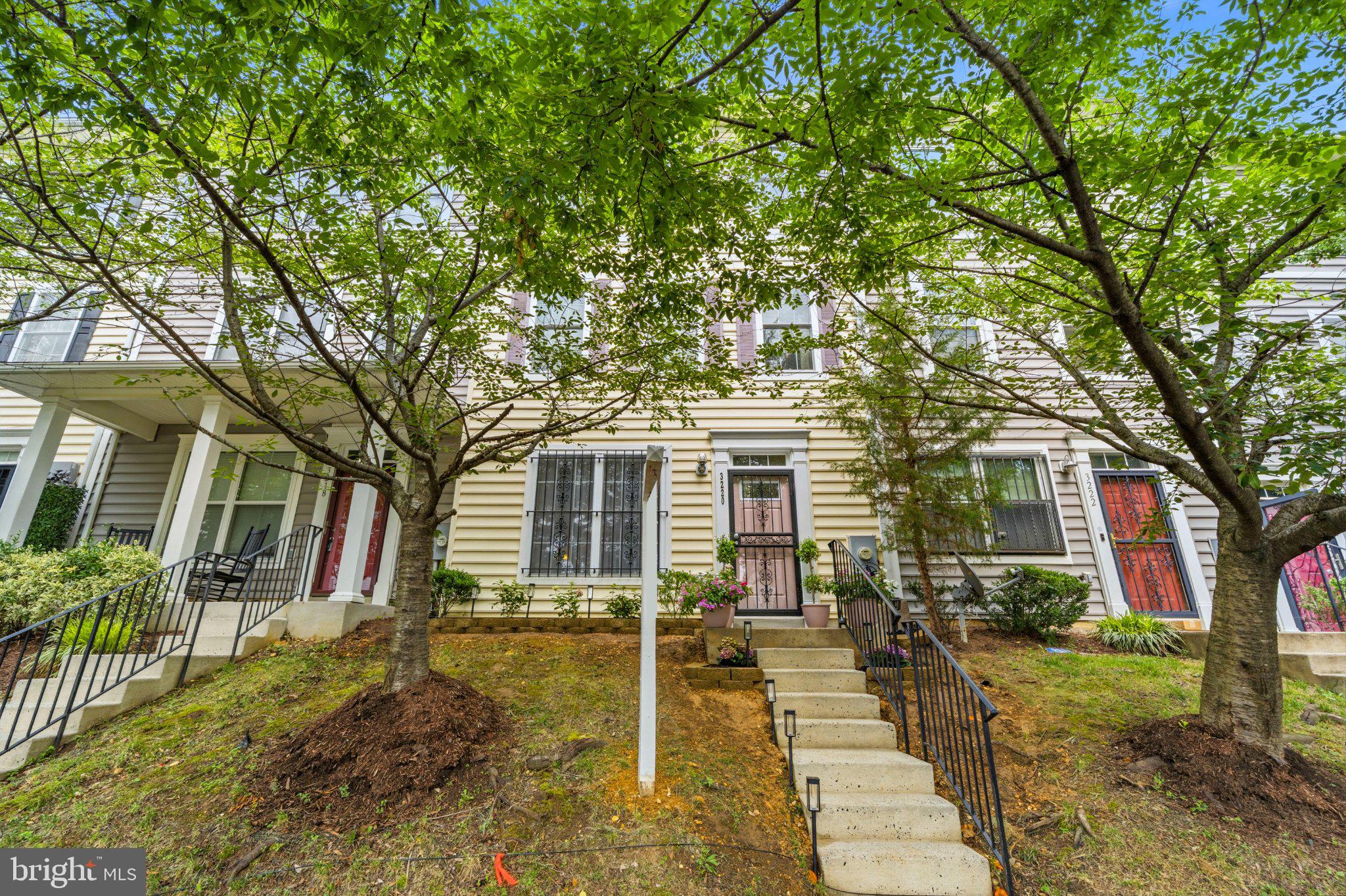 3220 15th Place Southeast Washington, DC 20020 - Photo 5 of 34 Charming townhouse with lush greenery.