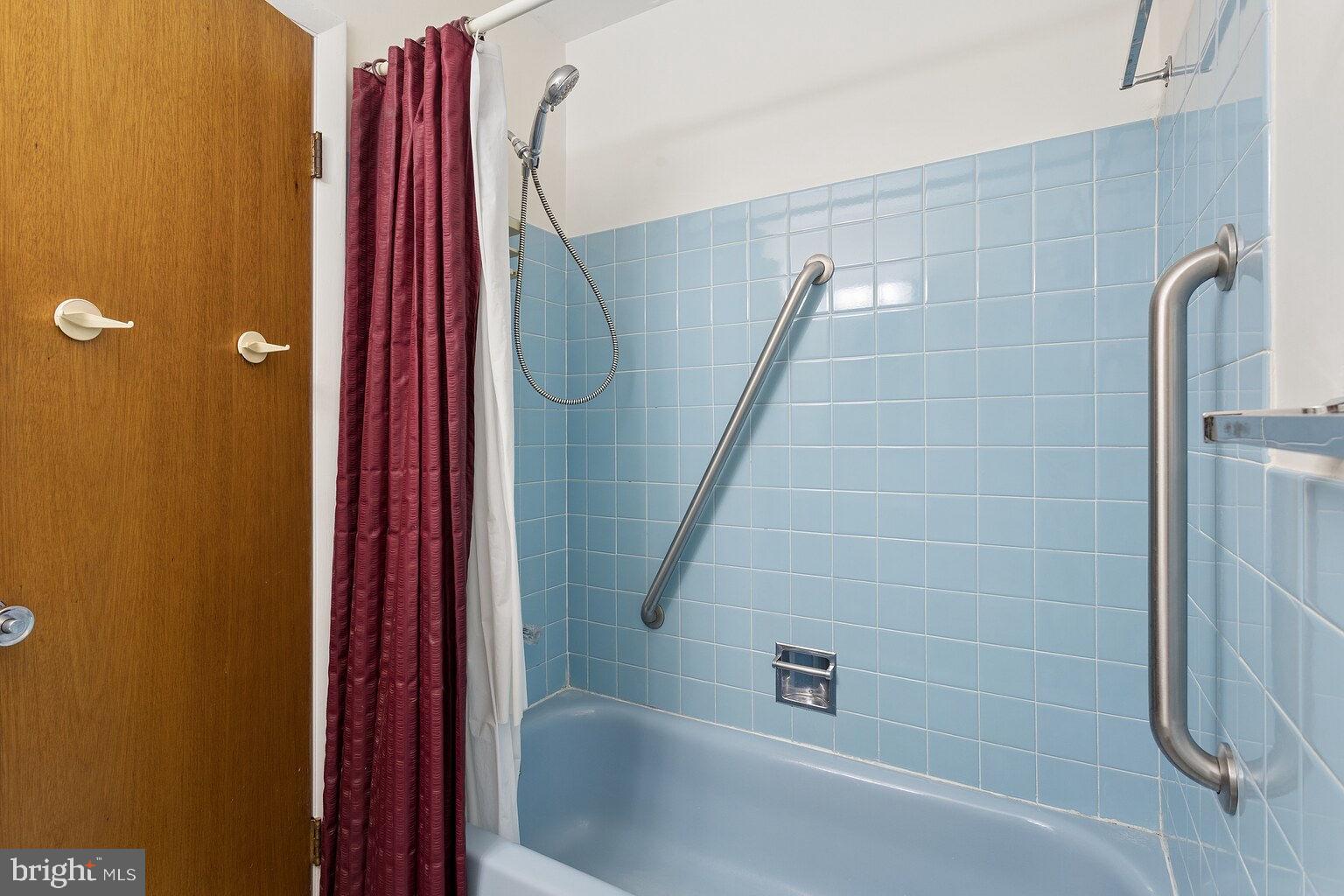 12010 Academy Road Philadelphia, PA 19154 - Photo 18 of 30 a bathroom with a shower and a bathtub