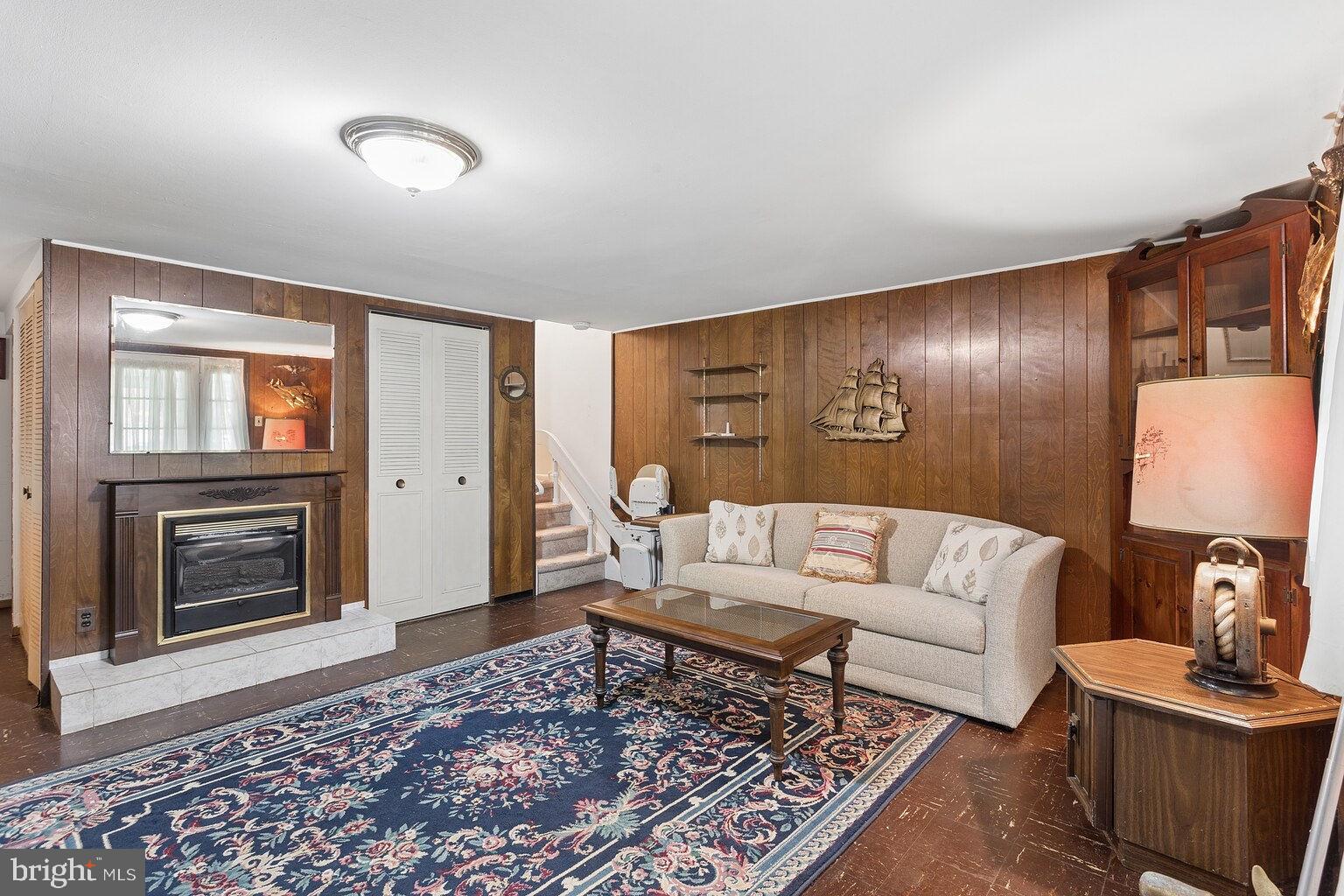 12010 Academy Road Philadelphia, PA 19154 - Photo 20 of 30 a living room with furniture and a fireplace