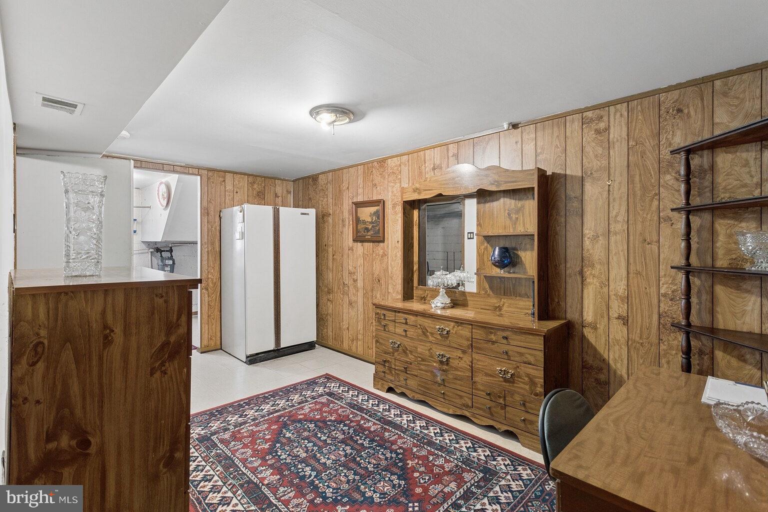 12010 Academy Road Philadelphia, PA 19154 - Photo 23 of 30 a large bedroom with a bed and a dresser