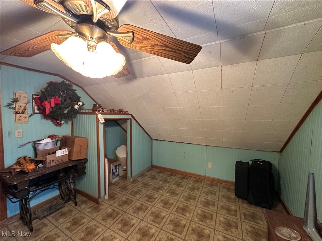 4058 Pardee Road Stow, OH 44224 - Photo 21 of 24 Bedroom with ceiling fan, baseboards, vaulted ceiling, and tile patterned floors