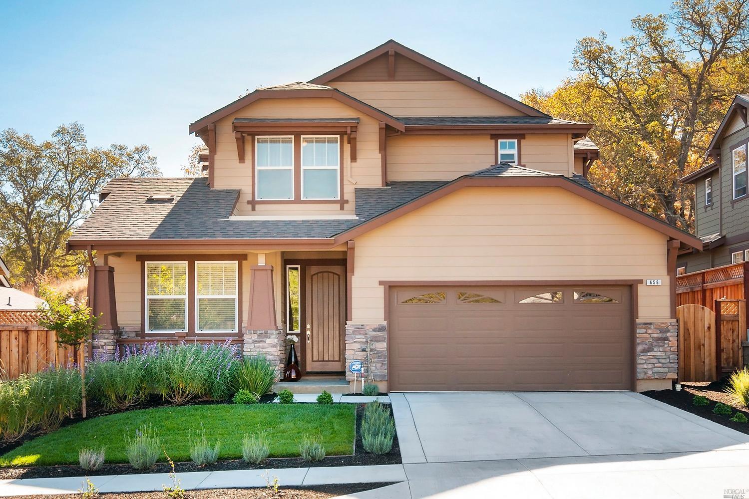 658 Canyon Road Novato, CA 94947 - Photo 1 of 1 a front view of a house with a yard and potted plants
