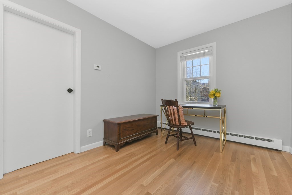 67 Broadway, Unit 1 Chelsea, MA 02150 - Photo 12 of 20 a view of a workspace with furniture and a window
