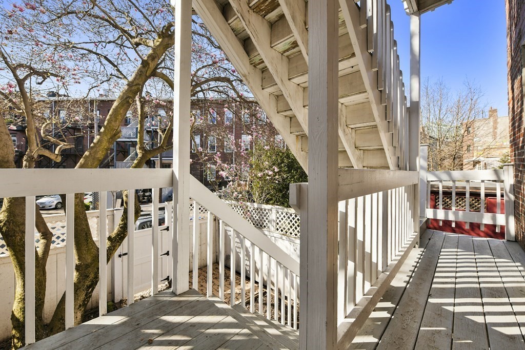 67 Broadway, Unit 1 Chelsea, MA 02150 - Photo 15 of 20 a view of a building from a balcony