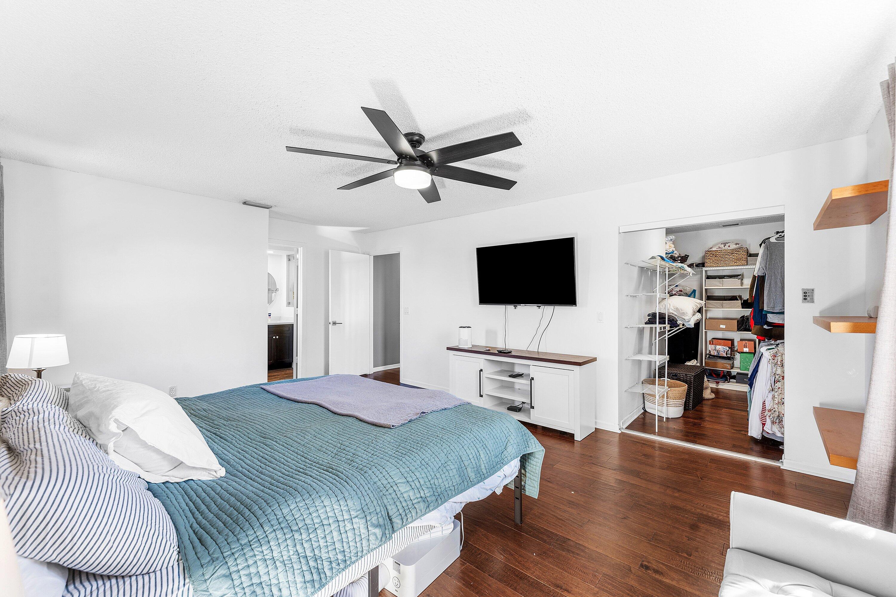 19931 Villa Lante Place Boca Raton, FL 33434 - Photo 24 of 47 a bedroom with a bed and a flat screen tv