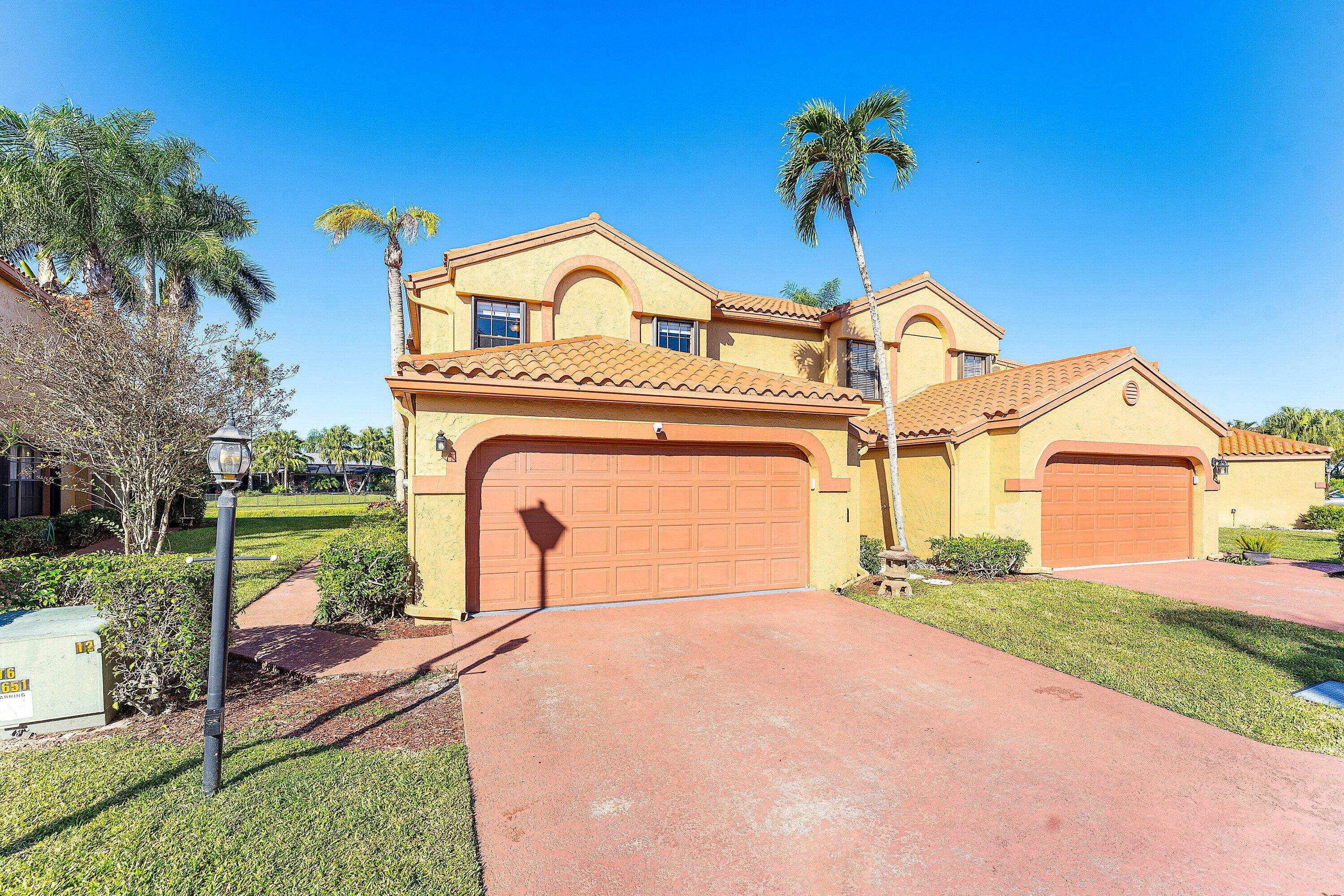 19931 Villa Lante Place Boca Raton, FL 33434 - Photo 3 of 47 a view of a house with a yard