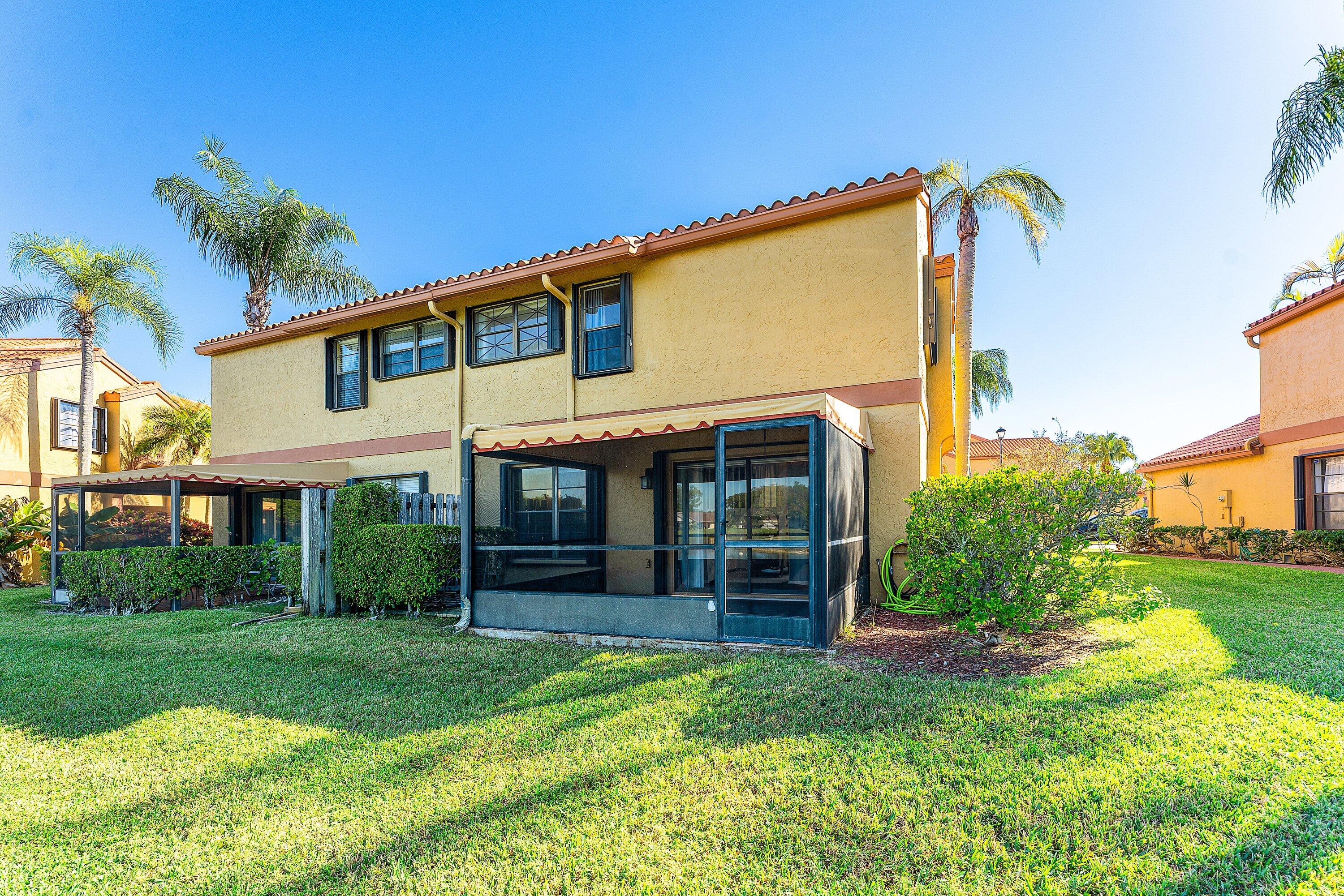 19931 Villa Lante Place Boca Raton, FL 33434 - Photo 36 of 47 a view of a house with a yard