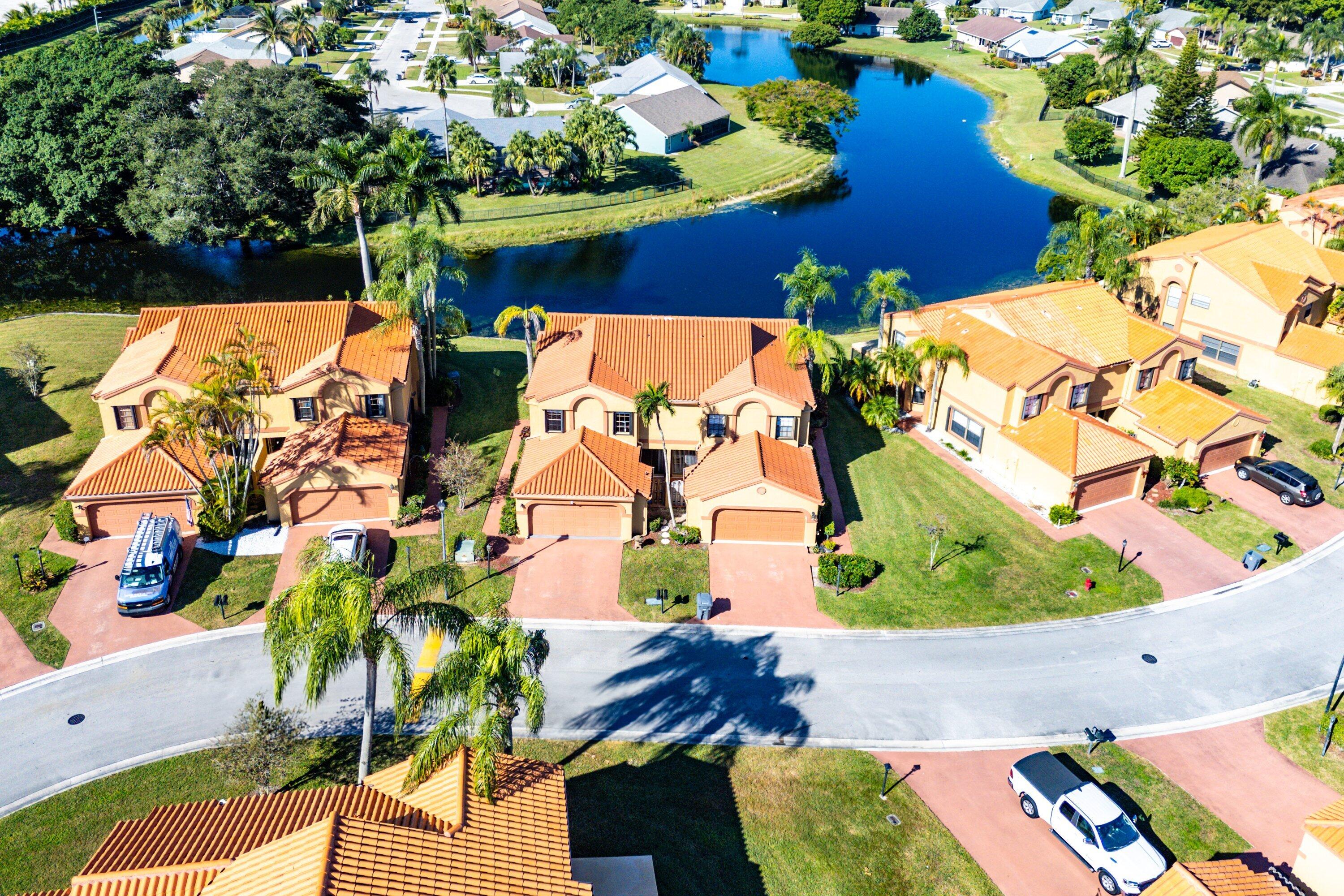 19931 Villa Lante Place Boca Raton, FL 33434 - Photo 41 of 47 an aerial view of a house with a yard and potted plants