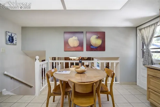 a bedroom with furniture and a book shelf