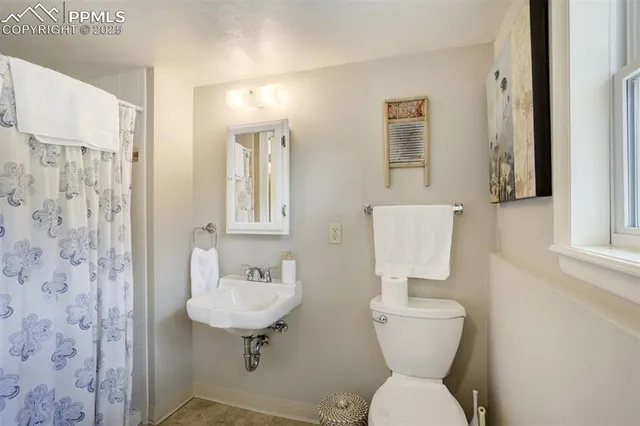 a bathroom with a shower and a bathtub