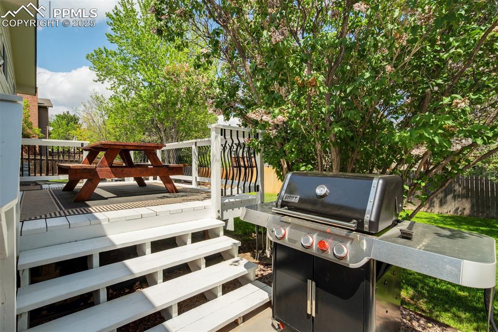 535 Silver Spring Circle Colorado Springs, CO 80919 - Photo 45 of 50 a view of a balcony with chairs