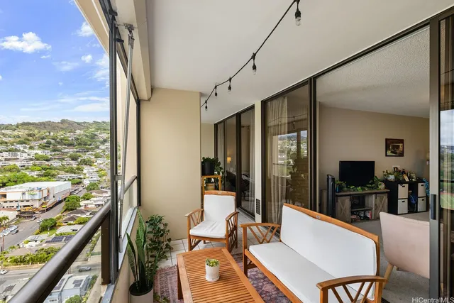 a view of a living room and dining room